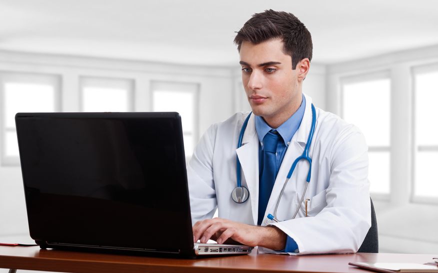 Doctor using electronic intake forms